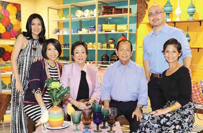 CHAR Panutat-Carlos and Leona Lavina-Panutat (left) and Mara Coscolluela and husband KirbyQuintal (right) are behind the success of L’Indochine store at theMega Fashion Hall. With them are their parents andmentors: Linda Panutat and architect Willy Coscolluela