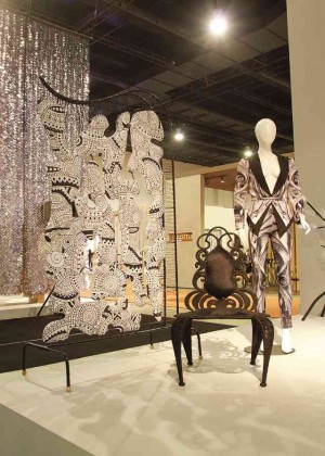 STANLEY Ruiz’s black-and-white ethnic-designed screen and abaca baroque chair by Enpekei blends with the complexity of Avel Bacudio’s patterned suit.