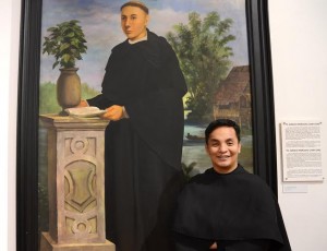 SAN AGUSTIN Museum director Fr. Ricky Villar, OSA, before a portrait of Fr. Ignacio Mercado, OSA. PHOTOS BY DEXTER R. MATILLA