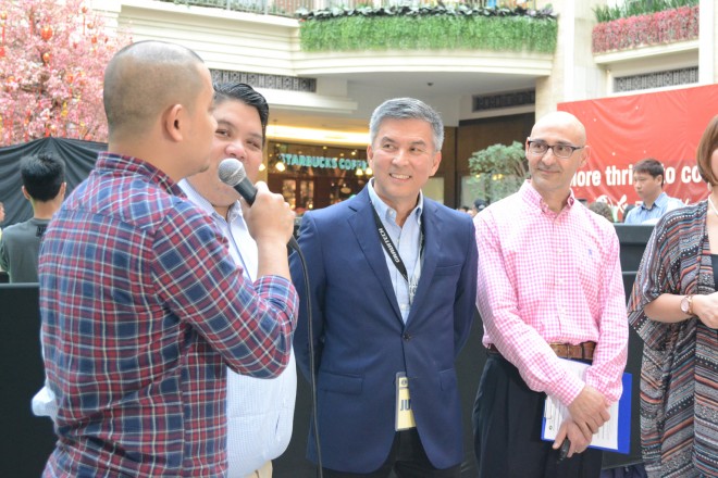 Mr. Leo de Leon (center) and Mr. Lauro Fioretti (second to the farthest right) are being interviewed by the media before the start of the 2016 Philippine National Barista Championship.