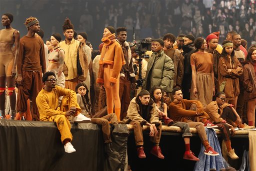 Models wear fashion from the Yeezy collection at a presentation and album release for Kanye West's latest album, "The Life of Pablo," Thursday, Feb. 11, 2016 at Madison Square Garden in New York. AP PHOTO