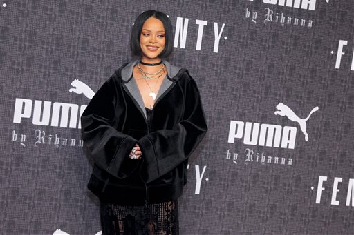 Rihanna attends the JFENTY PUMA by Rihanna fashion show at 23 Wall Street on Friday, Feb. 12, 2016, in New York. AP/INVISION PHOTO