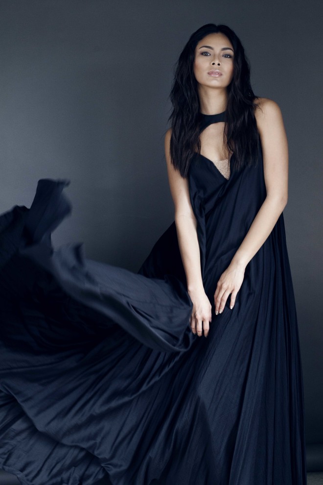 The muse. Expect Maxine to don a lot of pieces by Rhett Eala, including this black halter trapeze dress in rayon.