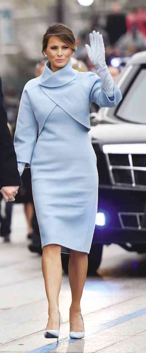 US First Lady Melania Trump wears a Ralph Lauren design to her husband’s inaugural. —AFP