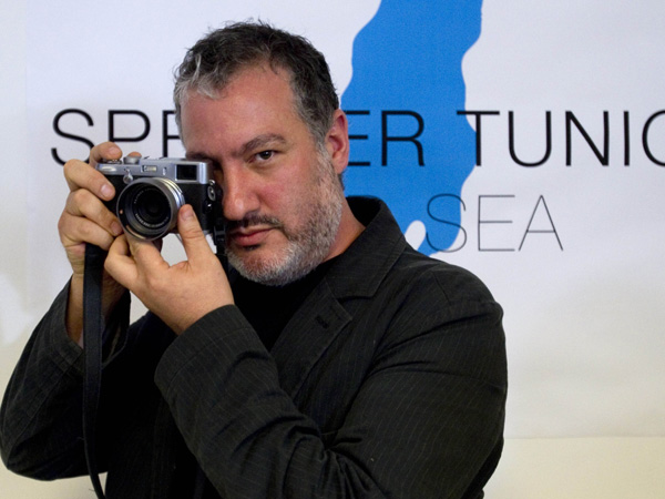 US art photographer Spencer Tunick checks a camera during a press conference in Tel Aviv ahead of his trademark mass shoots of naked volunteers, this time at Israel's Dead Sea shoreline on September 17. AFP