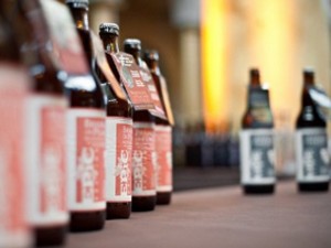 Bottles of Brianless on Peaches, a Belgian style ale, are displayed at Savor, a craft beer show, at the Building Museum in Washington on June 8, 2012. A growing number of Americans have developed a passion for full-flavored beers from small-volume, fiercely independent local breweries that are redefining how the United States takes its favorite tipple. AFP PHOTO/Nicholas KAMM