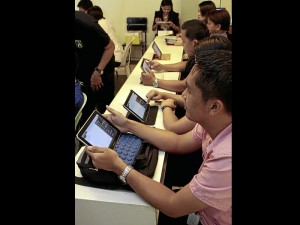 INDISPENSABLE: Teachers working with the tablets (Inquirer Photo/Alanah Torralba)