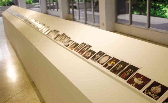 LONG display of postcards of images Abad scanned and reproduced from two 1991 auction catalogs from Christie’s. PHOTOS BY ALANAH TORRALBA