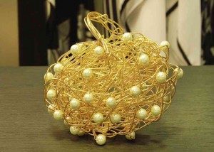 MINAUDIERE with twisted golden wires and pearl accents