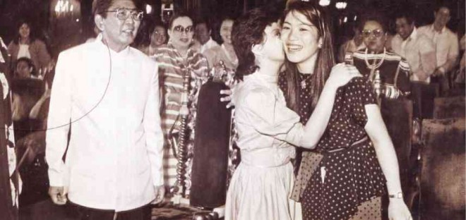 Below, a rarely seen smiling President Marcos ogling pianists Rowena Arrieta and Cecile Licad in Malacañang a year before People Power