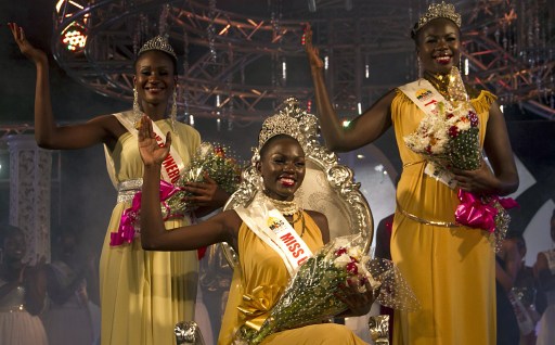 Leah Kalanguka (c), newly elected Miss Uganda, poses for a picture with 1st runner up Brenda Iriama (L) and 2nd runner up Yasmin Taban (R) in Kampala on October 26, 2014.  AFP