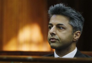 Shrien Dewani, British murder accused, sits in the Cape Town High Court, waiting for his trial to start, on October 06, 2014, in Cape Town. AFP