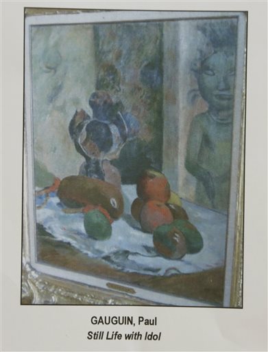 This undated photo released by the Presidential Commission on Good Government shows a painting by Paul Gauguin titled "Still Life with Idol," which is allegedly part of the rare art collections of the late Philippine dictator Ferdinand Marcos. AP 