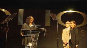 WHOOPI Goldberg introduces the first Filipino agency to win the Grand CLIO. Merlee Jayme and Alex Syfu accept the award.