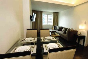 LIVING and dining areas of a one bedroom suite