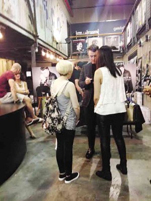 SAM SMITH signing fans’ records at Rough Trade
