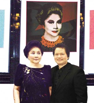 FORMER first lady Imelda Marcos and artist-photographer Rupert Jacinto pose in front of her “Portraits of the Imagination” silkscreen, done by Jacinto.