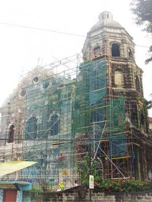 STA. Ana Church façade undergoing restoration