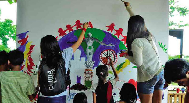 CHILDREN of families moved to a government housing site in Calauan, Laguna, find hope through an art mural.    photo: ISAGANI SERRANO/CONTRIBUTOR