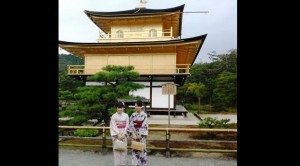 Locals in traditional garb love posing for tourists at the Golden Pavilion 
