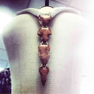 FINISHED PRODUCT. Inspired by the spinal cord, Neil’s back necklace uses texturized copper with antique finish.