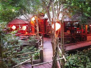 Cozy cabana restaurant serving vegetarian cuisine at Zhuo Ye Cottage Farm, where guests can try their hand at indigo dyeing, among other traditional crafts, and stay in one-of-a-kind accommmodations—old rice granaries converted into air-conditioned rooms, set against lush greenery