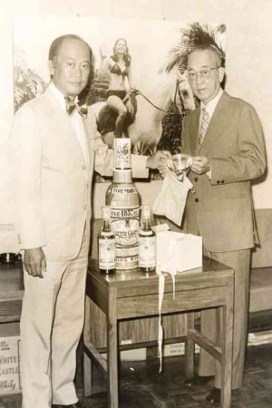 1978, Julius Limpe receives the Silver Funnel Award commemorating 25 years of success, with father James V. Limpe.