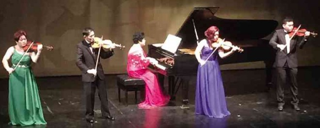 GILOPEZ Kabayao and his three children—Sicilienne, Farida and Gilberto—on the violin, and Corazon Kabayao on the piano