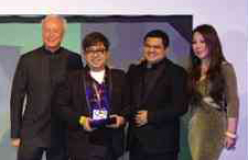 ALBERT Andrada receives award from organizers and sponsors of Malaysia Fashion Week.