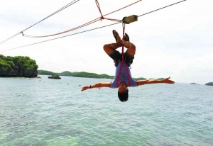 HIGHLY skilled zipline operators secure the rider with a harness and protective headgear. One glides above the clear waters and sees the island from a rare bird’s eye view.