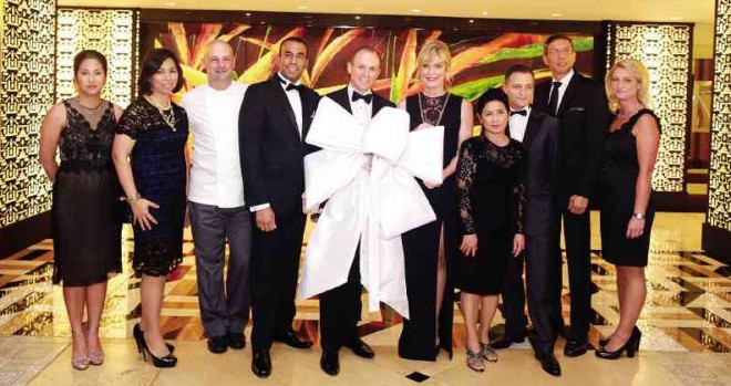 SOFITEL Philippine Plaza executive committee celebrates the unveiling of the Grand Plaza Ballroom:Marian Villar, director of HR; Hazel De Jesus, director of rooms; Eric Costille executive chef; Alfredo Denage, resident manager; Adam Laker, general manager; Chanelle Garvey, outgoing director of sales andmarketing; Lina Solis, director of finance; Damien Marchenay, director of food and beverage; Andy Martinez, director of engineering; and Alice Jenkins, director of sales andmarketing