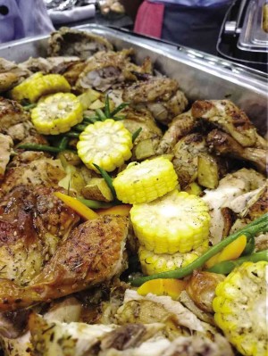 “FROMFARMto fork” sample dishes at Epicurious: country roast chicken with local vegetables.