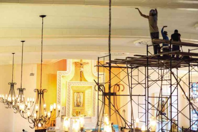 THE SCAFFOLDING used by workers is removed when there is a HolyMass.