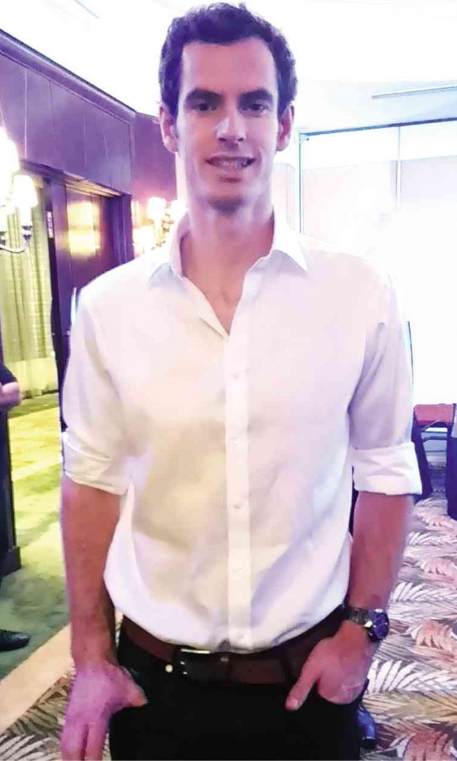 A FRESHLOOKING Andy Murray had just come off of a long-haul flight from London.