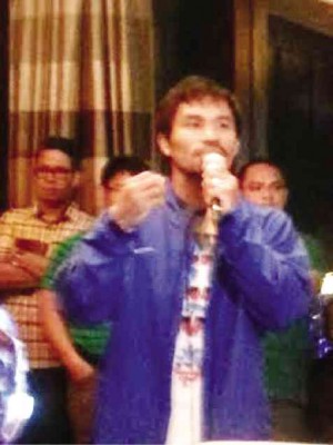 MANNY Pacquiao explains themessage of a passage to family and friends during a Bible reading session in hisMacau hotel suite; at right, Sylvester Stallone arrives at The Venetian Macao’s Cotai Arena.