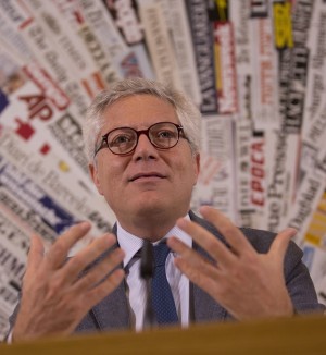 In this Dec. 11, 2014 photo, made available Monday, Dec. 22, 2014, Italy's antitrust authority Chairman Giovanni Pitruzzella gestures during a press conference at the Foreign Press Association in Rome. The antitrust authority has fined Monday travel planning website TripAdvisor 500,000 euros (more than $600,000) based on complaints of improper business practices lodged by a national hoteliers' association and a consumer protection agency.  AP