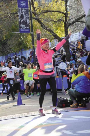 MARIE Moñozca at the NYCM finish line