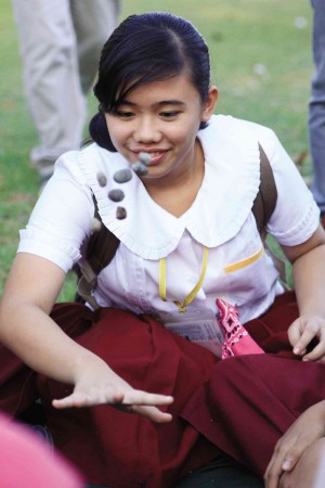 STUDENT from Bacolod plays poro game of Bohol