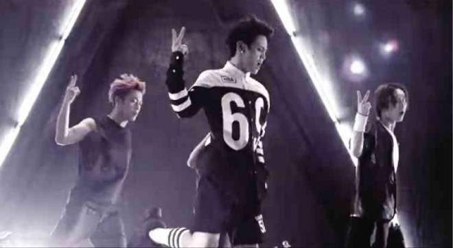 BEAST’Smain singer Yang Yoseob (center), noted for his soaring vocals, wears goalkeeper shirt and shorts in the dance sequence of “Good Luck,’’ released around the time of the World Cup in Brazil. The choreography, notes Billboard, “feels like the most athletic and impressive showing yet from K-Pop dance this year.”