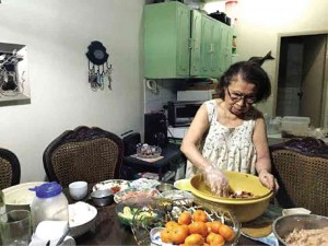 Lola Charit in her kitchen