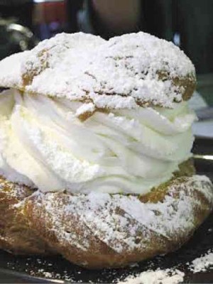 Cream puff filled with whipped cream, served in Birkholm’s Danish Bakery in Solvang, California