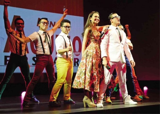 “HERE Lies Love” cast performing at the 60th Evening Standard Theatre Awards; Ferrer is third from left. DAVE BENETT