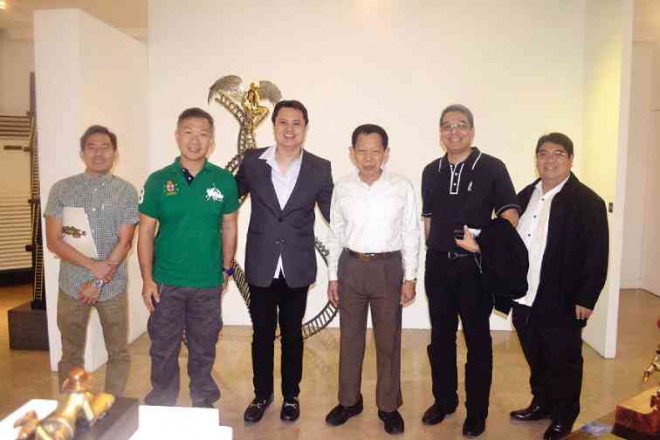 FROM left: Avid Cacnio collectors Jeff Uy and Emil Yap, sculptorMichael Cacnio, NCCA chair Felipe de Leon, NCCA National Committee on Art Galleries vice head Delan Robil