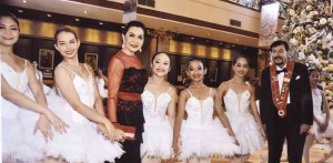 AMPARITO andMichel Lhuillier amid the dancers from Balletcenter at the lobby of theMarco Polo Plaza Hotel