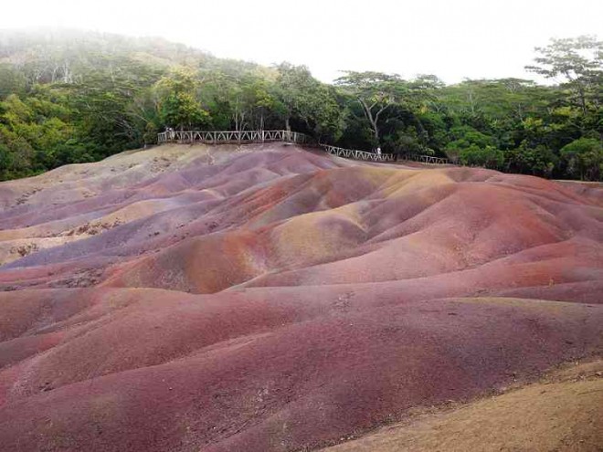 NATURALWONDER. The Seven-Coloured Earth at Chamarel in southwestern Mauritius, a unique stretch of sand dunes streaked in vivid natural pastel colors GIBBS CADIZ