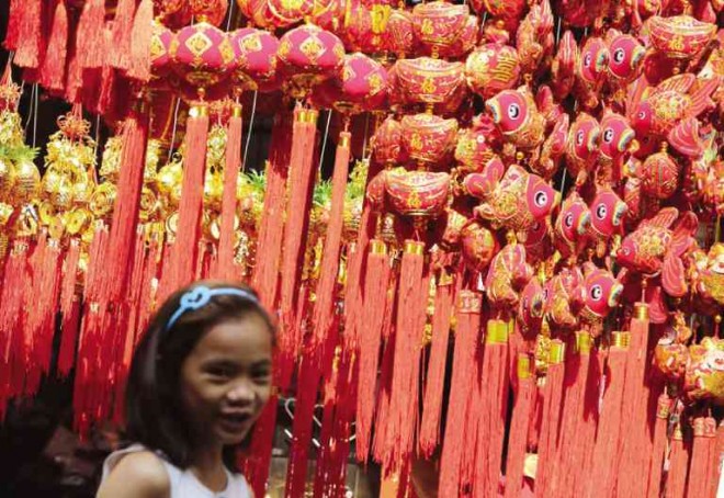NO BLACK SHEEP PLEASE  ’Tis the time of year to deck the halls with bright Chinese lanterns, ornaments and lucky charms believed to represent vitality and prosperity, as the Chinese New Year approaches. The Year of the Wooden Sheep makes its unique entrance on Feb. 19, 7:47 a.m. as the Year of the Wooden Horse exits.  JOAN BONDOC 