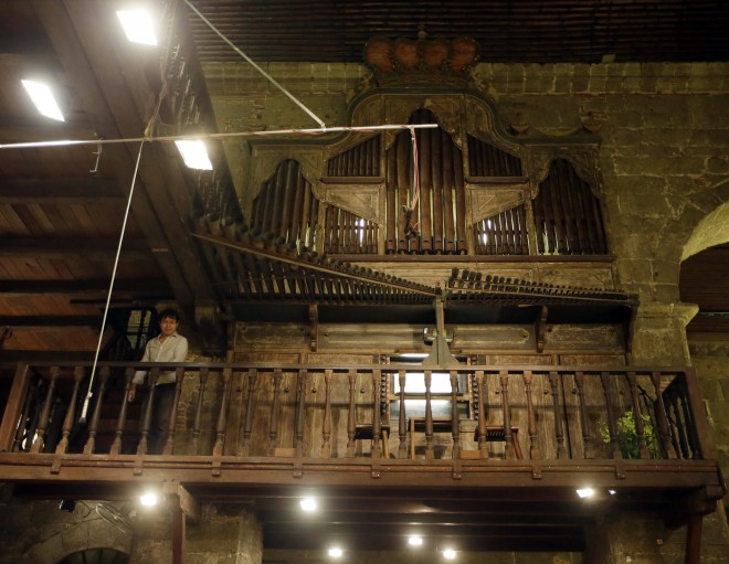 In this photo taken on Feb. 20, Prof. Armando Salarza stands by the loft housing the world famous Bamboo Organ prior to a concert rehearsal at St. Joseph Church in Las Piñas City. AP