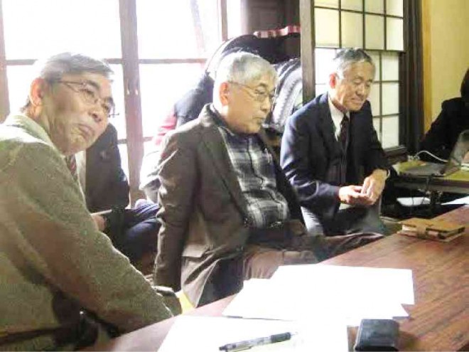 IN THE town ofNara, elderly staff brief reporters on their heritage efforts.