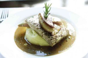 GRILLED tuna steak with foie gras and truffle sauce.