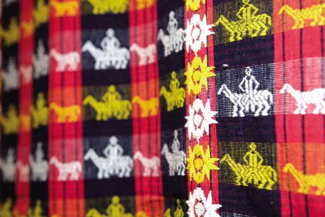 BLANKET (owes) from the Itneg of Penarubia, Abra province, pinilian technique, sinangagkabkabayo motif, cotton, early 20th century.